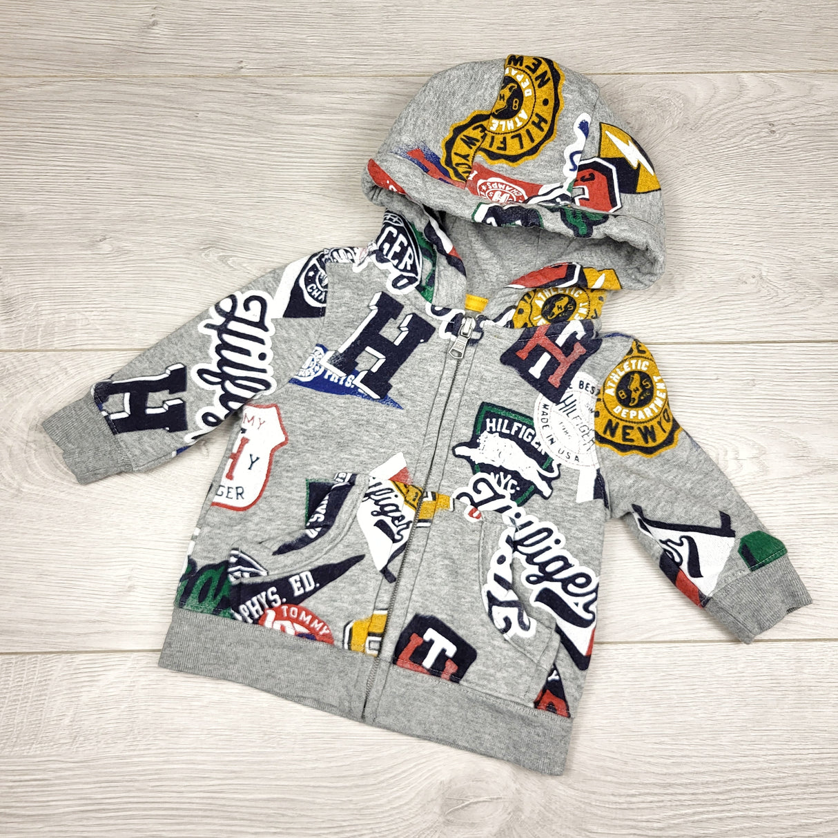 CHFF1 - Tommy Hilfiger grey fleecy lined zip up hoodie. Size 6-9 months