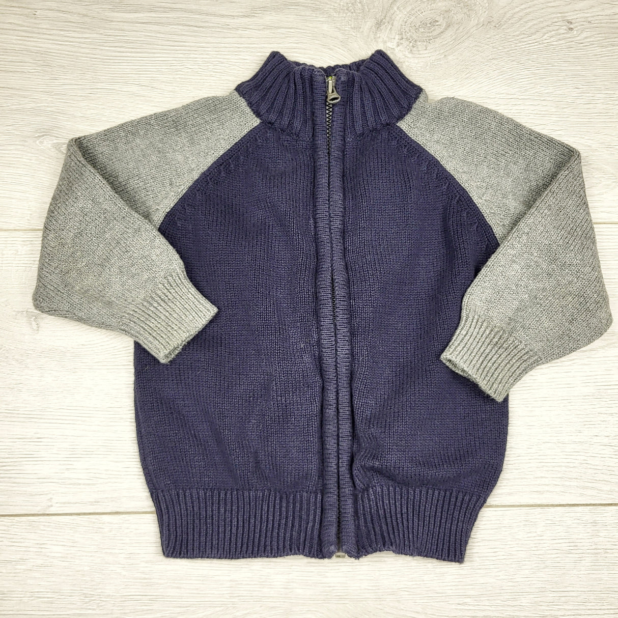 CHFF1 - Oshkosh grey and navy zip up sweater coat. Size 12 months