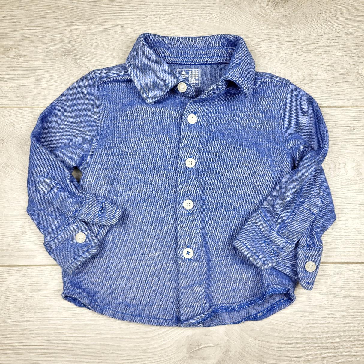 CHFF11 - Gap blue knit button down shirt. Size 12-18 months