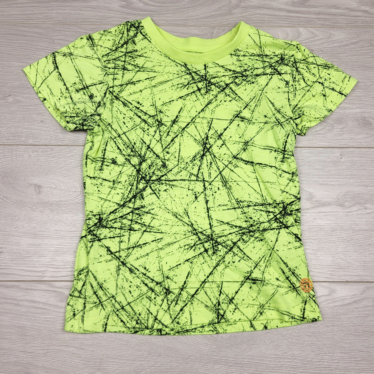 JLSN4 - Urban Dept neon yellow patterned t-shirt. Size 6