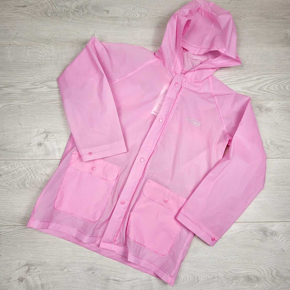 JLSN4 - Coleman pink hooded packable rain jacket. ADULT size small