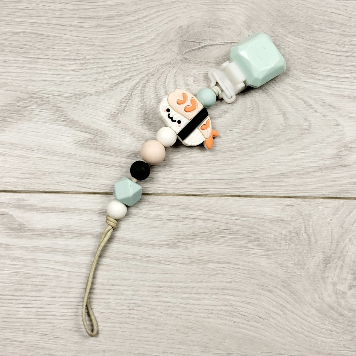 CRTH1 - Loulou Lollipop silicone pacifier clip with sushi