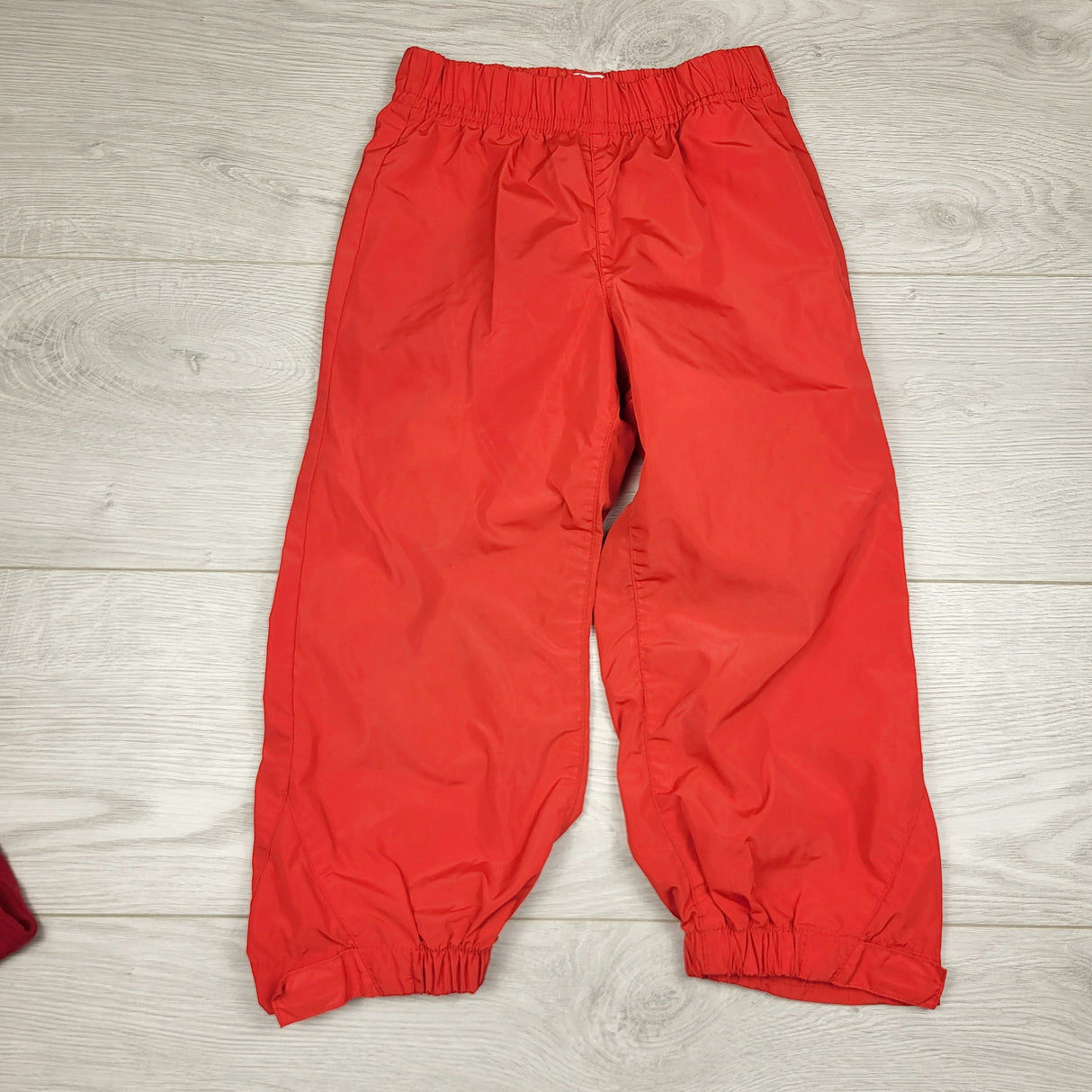 LUGE1 - Old Navy red rain pants. Size 3T