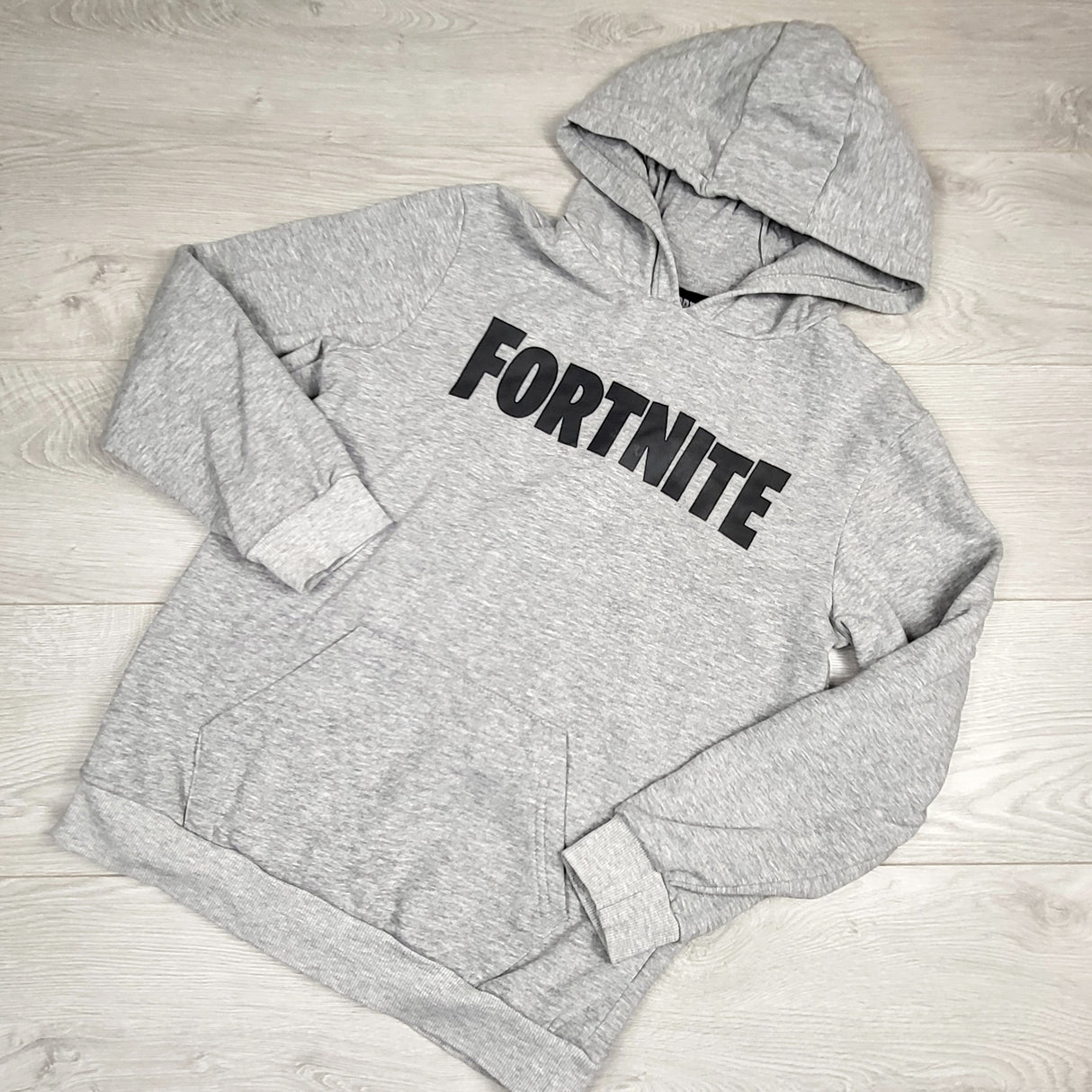 NREIM1 - Fortnite grey fleecy lined pullover hoodie. Sizes medium (sizes like a youth 14/16)