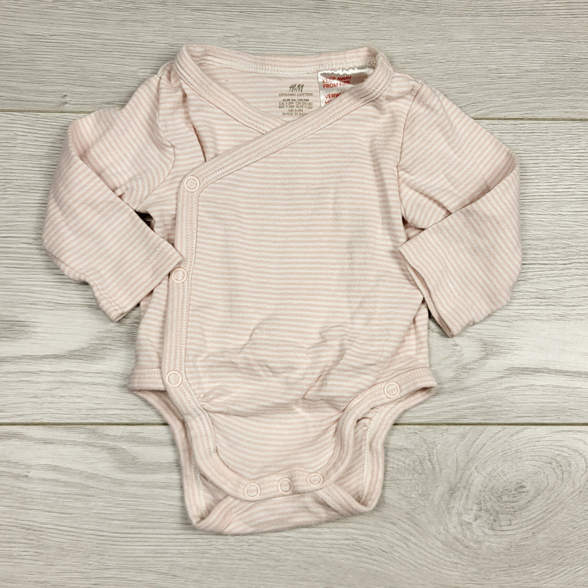 KHEN5 - H and M pink striped wrap style bodysuit. Size 1-2 months