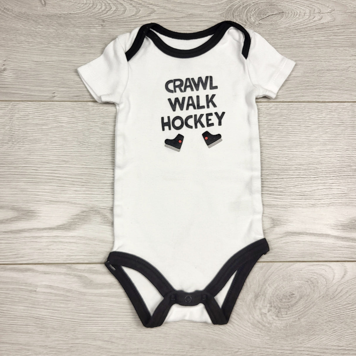 KHEN5 - Koala Baby white and black "Crawl, Walk, Hockey" bodysuit. Size 3-6 months