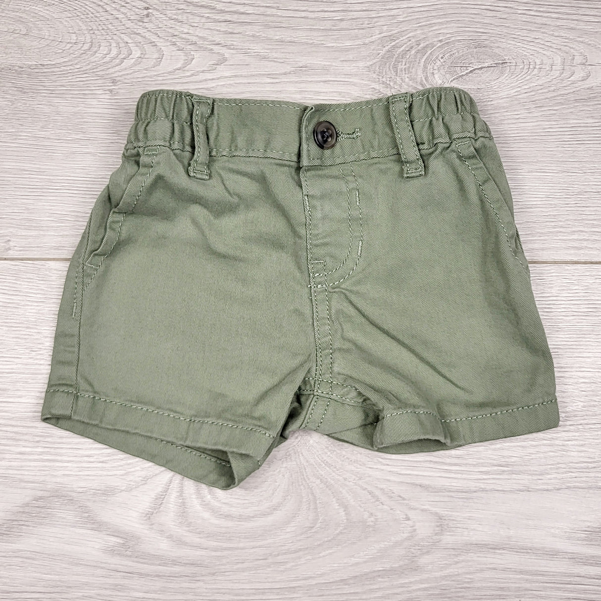 ADRT1 - Children's Place olive green twill shorts. Size 0-3 months