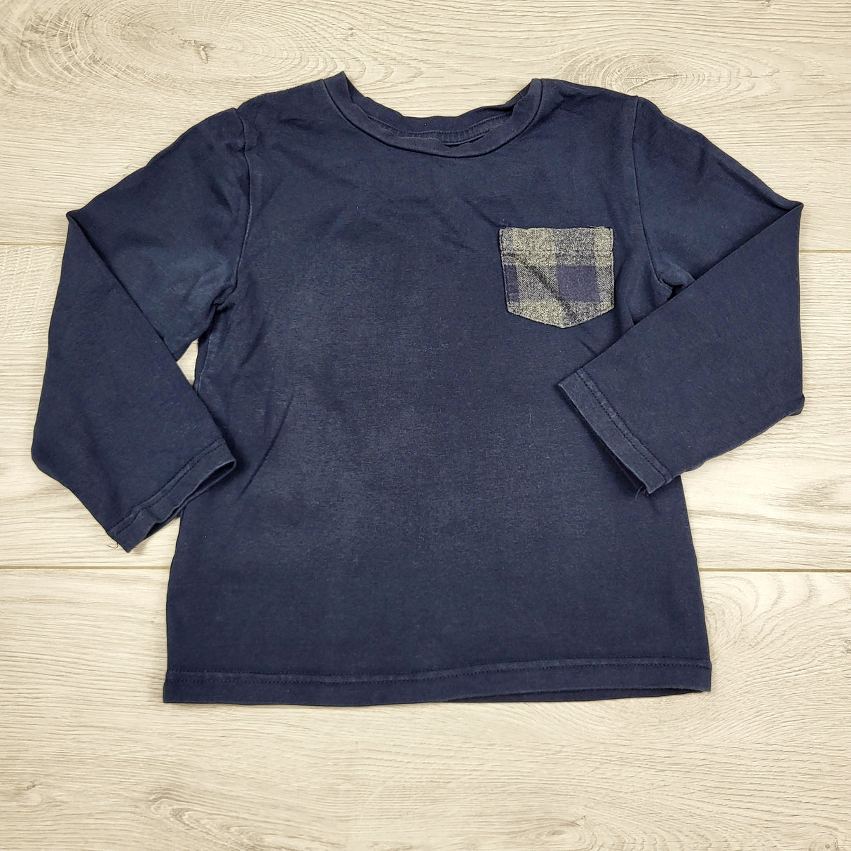 ULRT2 - Rorie Whelan navy long sleeved pocket shirt. Size 2T