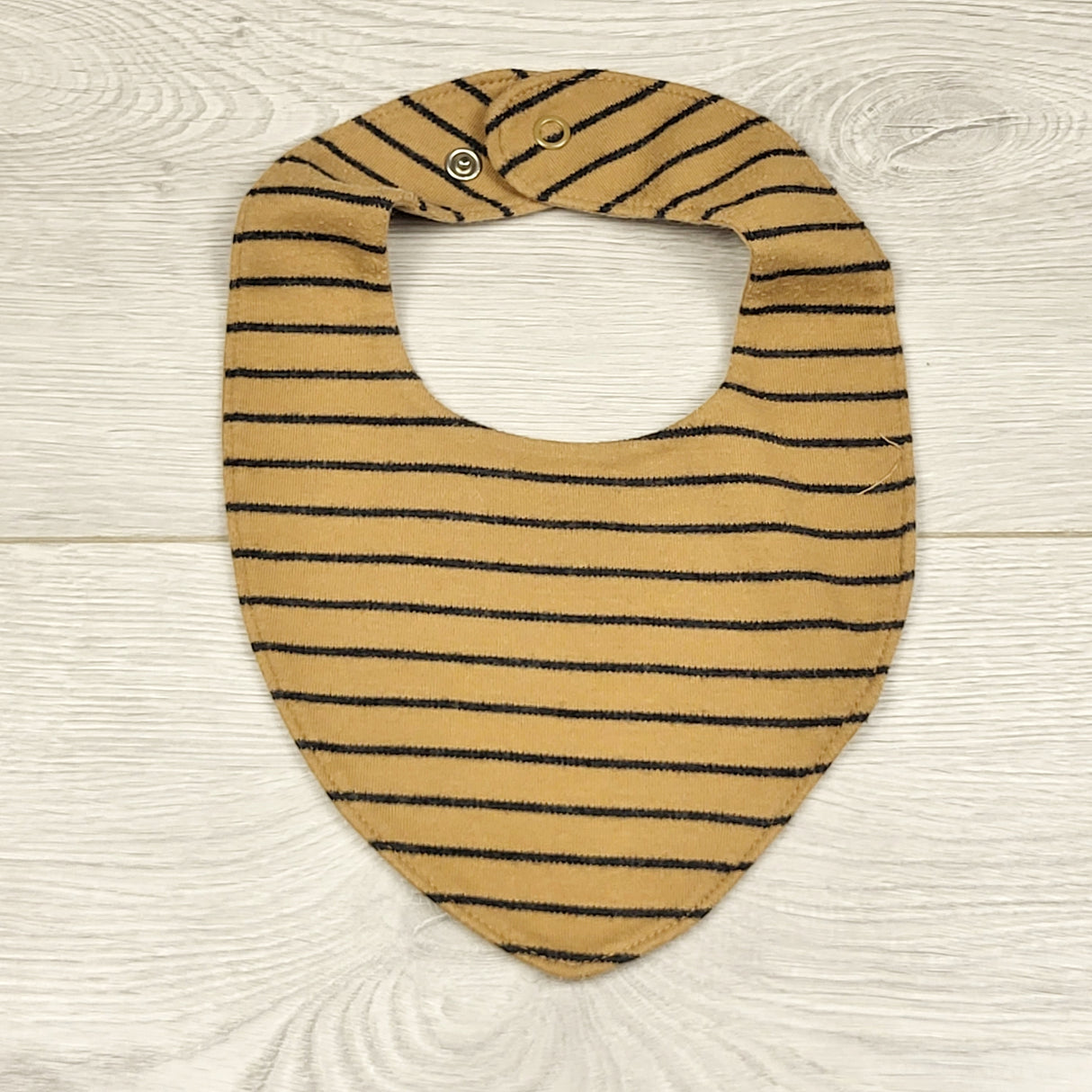 ADRT1 - Tan striped plastic backed bib