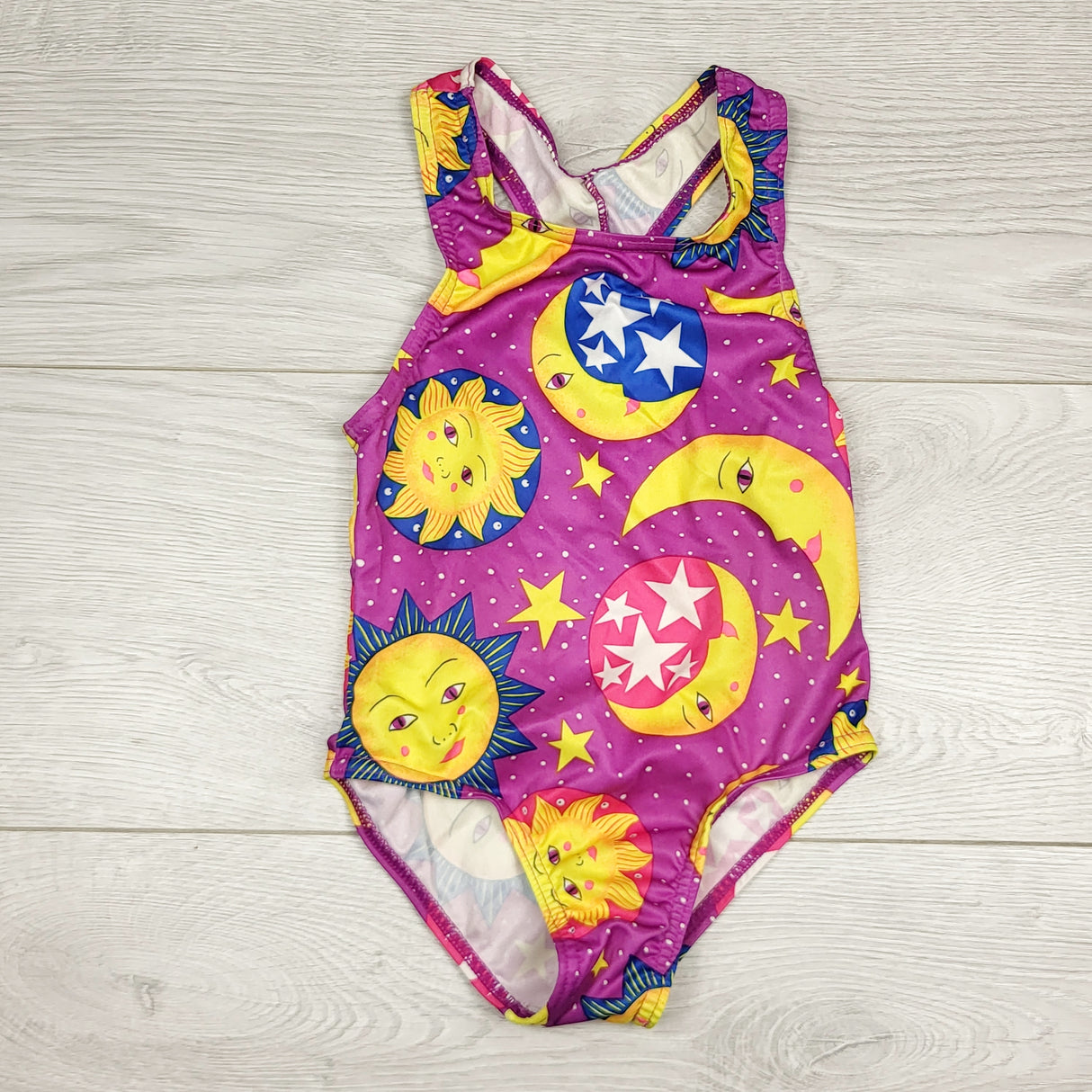 NKLB11 - Trapido one piece swimsuit with suns and moons. Approx 3T