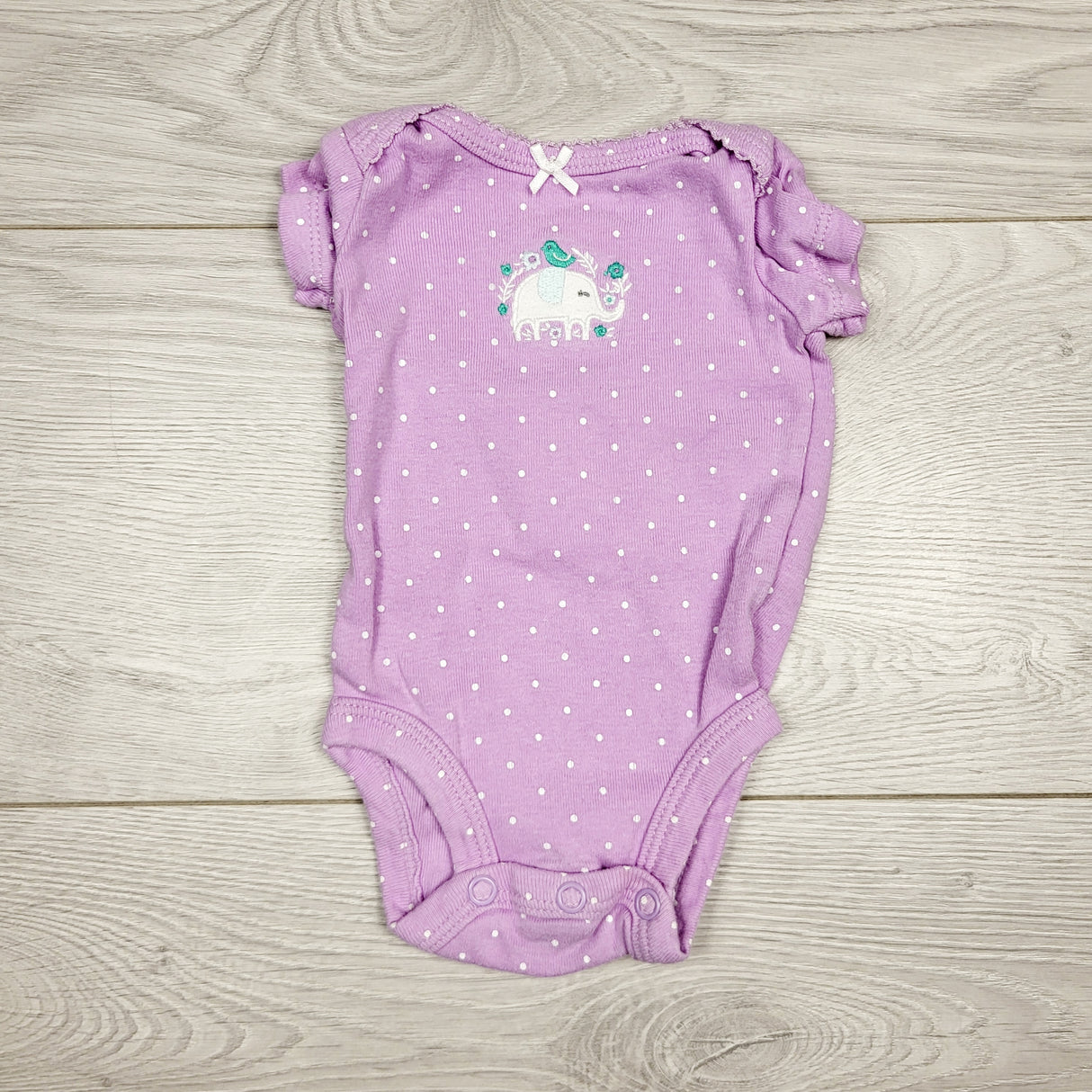 NKLB11 - Carters purple polka dot bodysuit with elephant. Newborn size