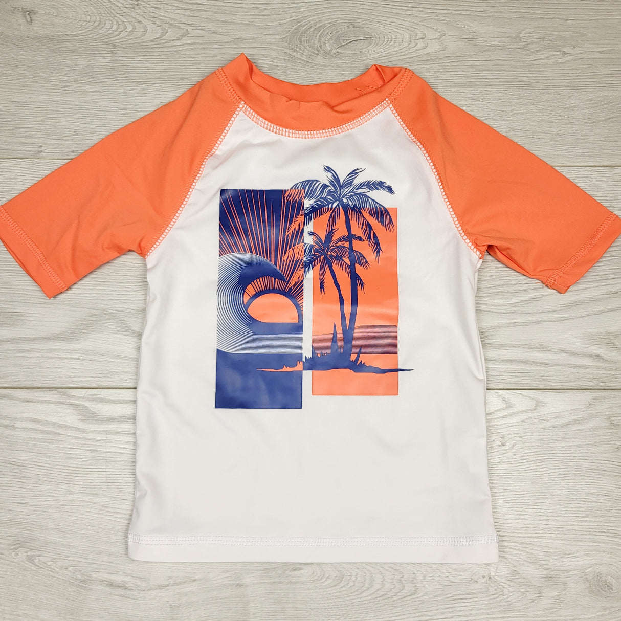 SMRSH1 - Children's Place white and orange rash guard with beach scene. Size XS (4/5T)