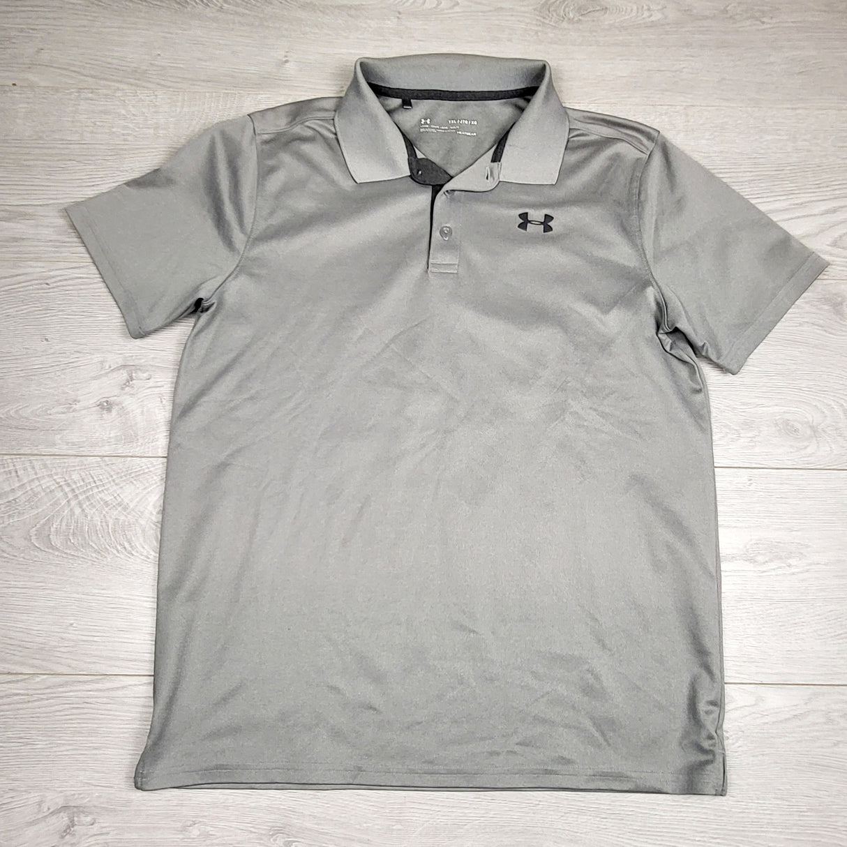 AWLS1 - Under Armour grey heat gear polo shirt. Size XL