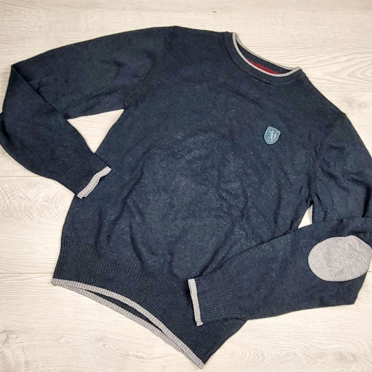 AWLS1 - L.O.G.G. navy sweater with arm patches. Size 12-14 years