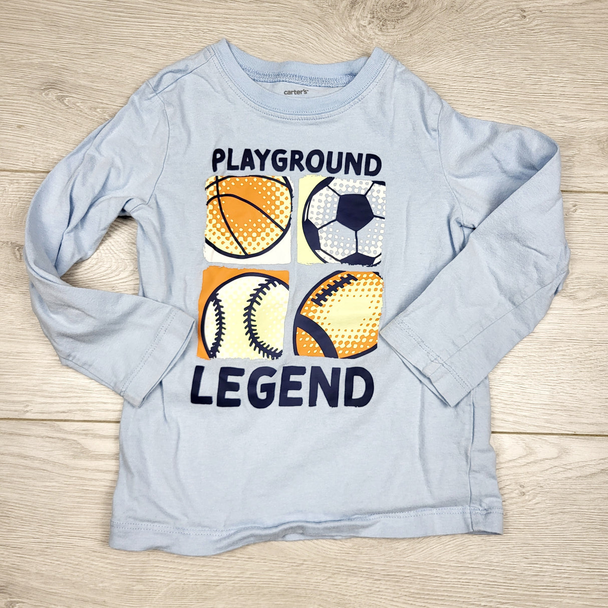 SMRSH3 - Carters light blue "Playground Legend" shirt. Size 2T