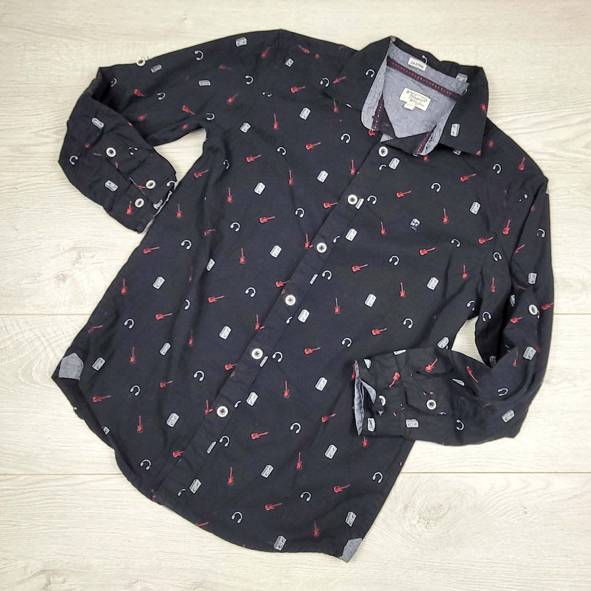 AWLS2 - Penguin navy music themed button down shirt. Size 10/12