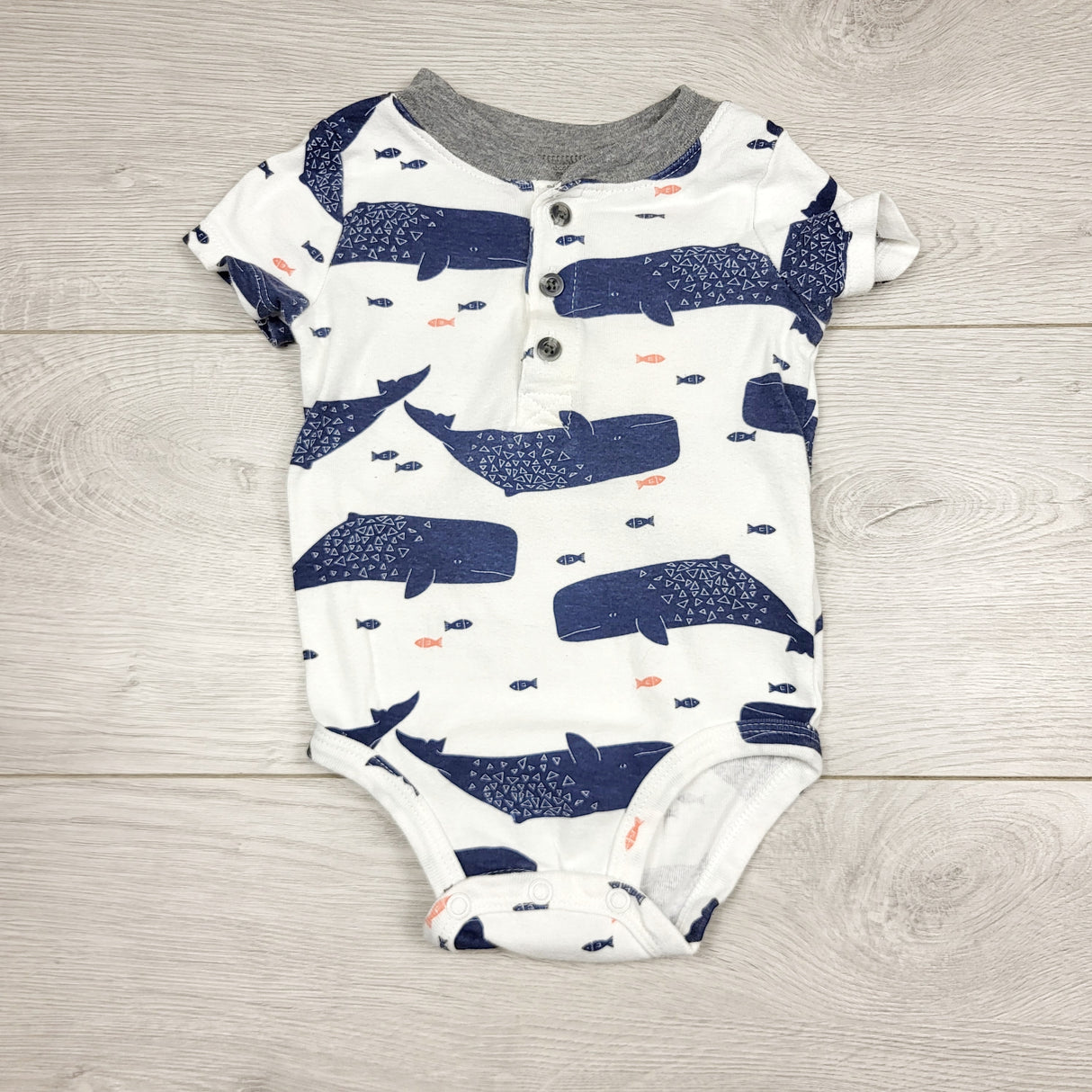 CHLV1 - Carters white and navy bodysuit with whales. Size 12 months