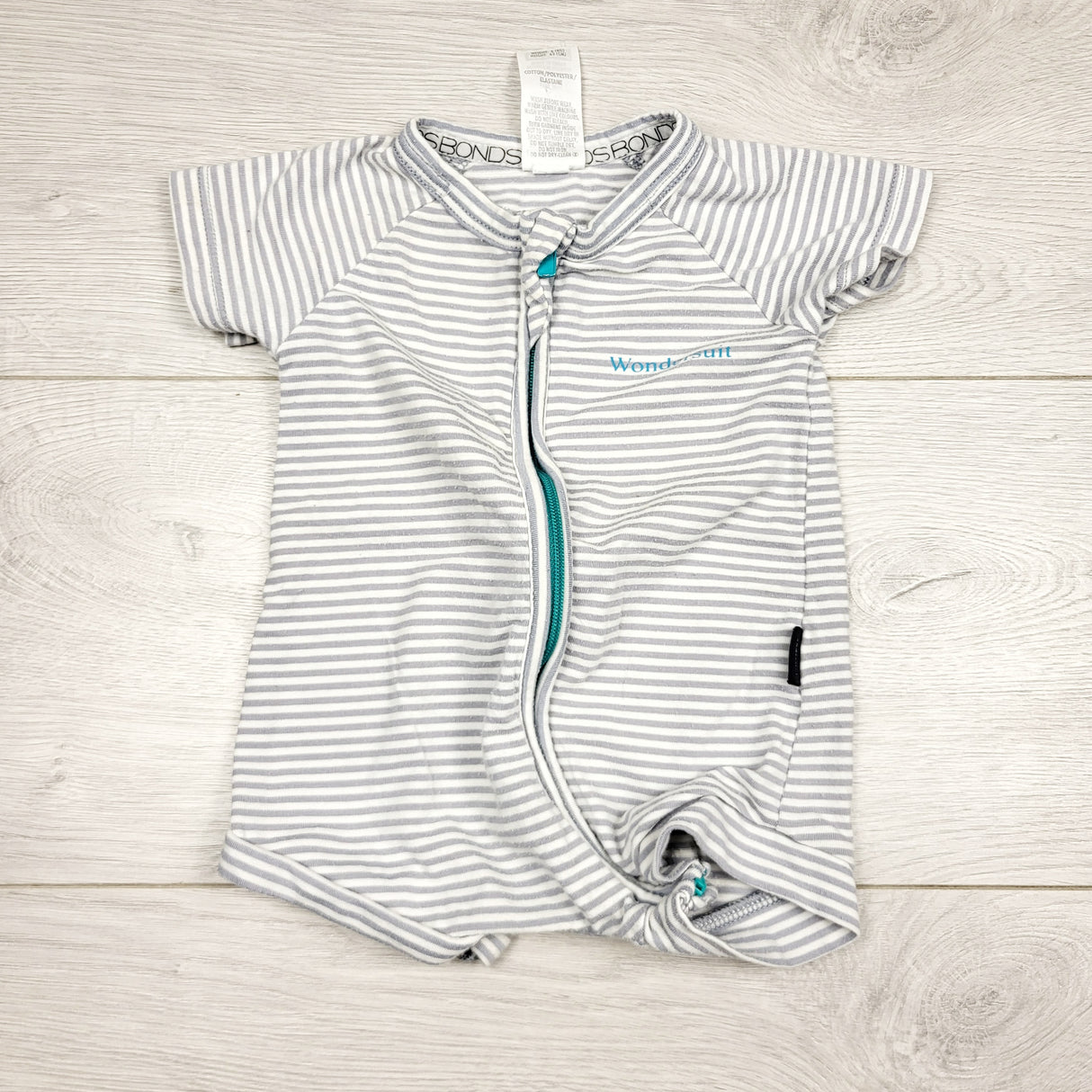 CHLV1 - Bonds grey striped short sleeved wondersuit. Size 0-3 months