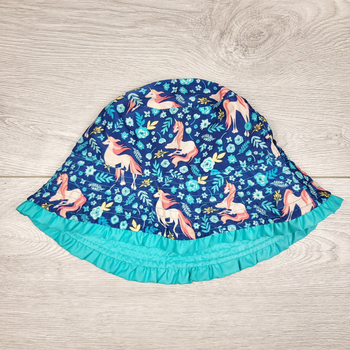 LBYL2 - UV Skinz reversible bucket hat with unicorns. Approx 4T