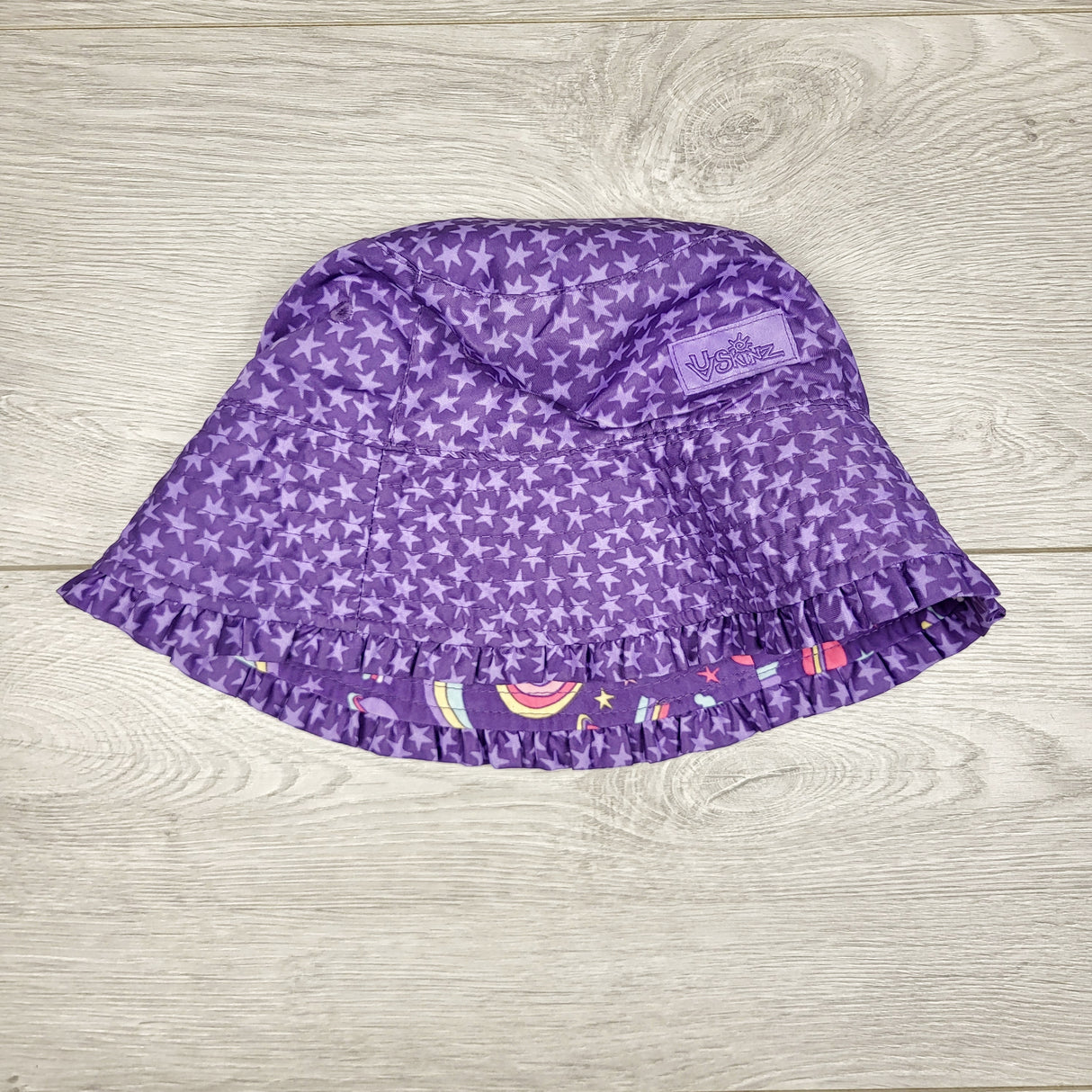 LBYL2 - UV Skinz purple patterned reversible bucket hat. Size 4T