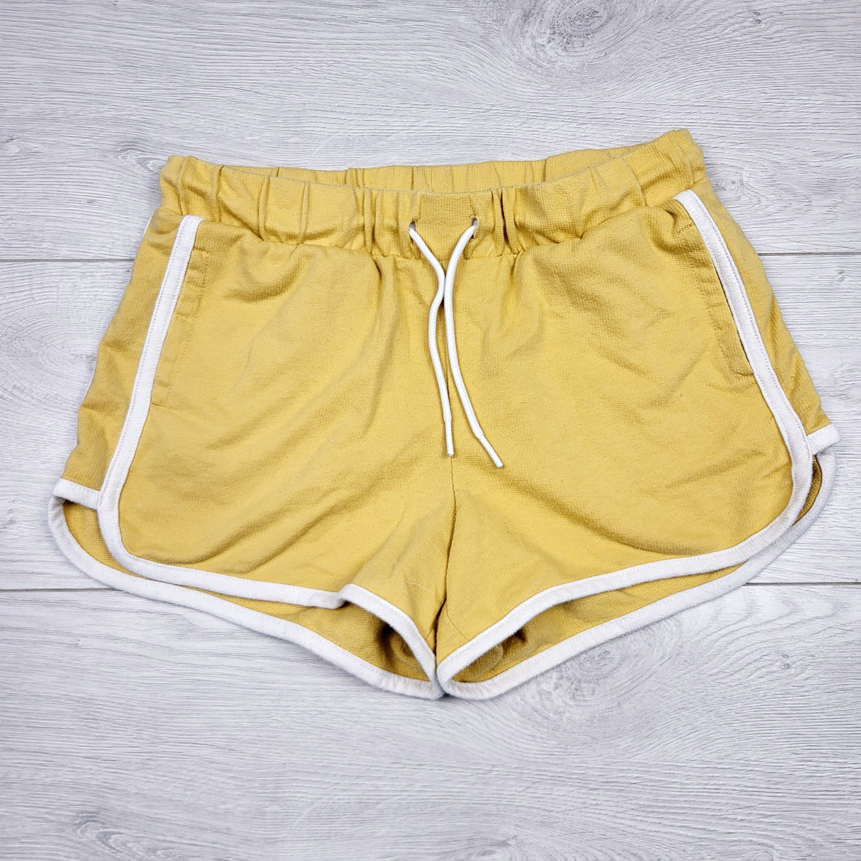 SHYS1 - Old Navy yellow cotton shorts with side stripe. Size 10/12