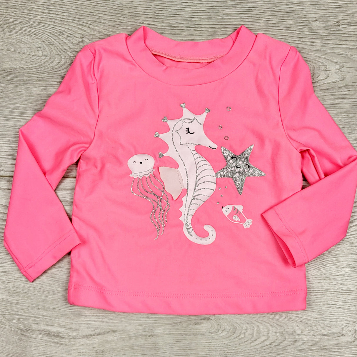 KARE2 - Carters pink rash guard with seahorse. Size 9 months