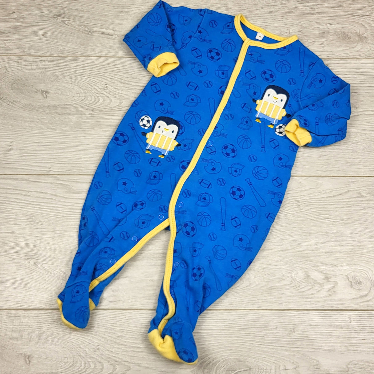 KARE22 - Pekkle blue cotton sleeper with penguins. Size 6 months