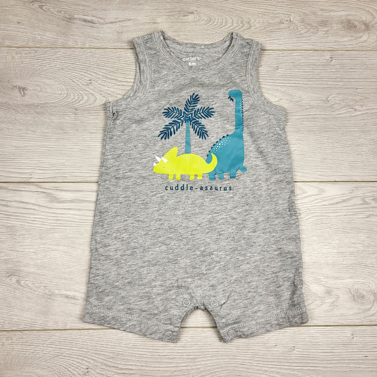 KARE22 - Carters grey tank style romper with dinosaurs. Size 6 months