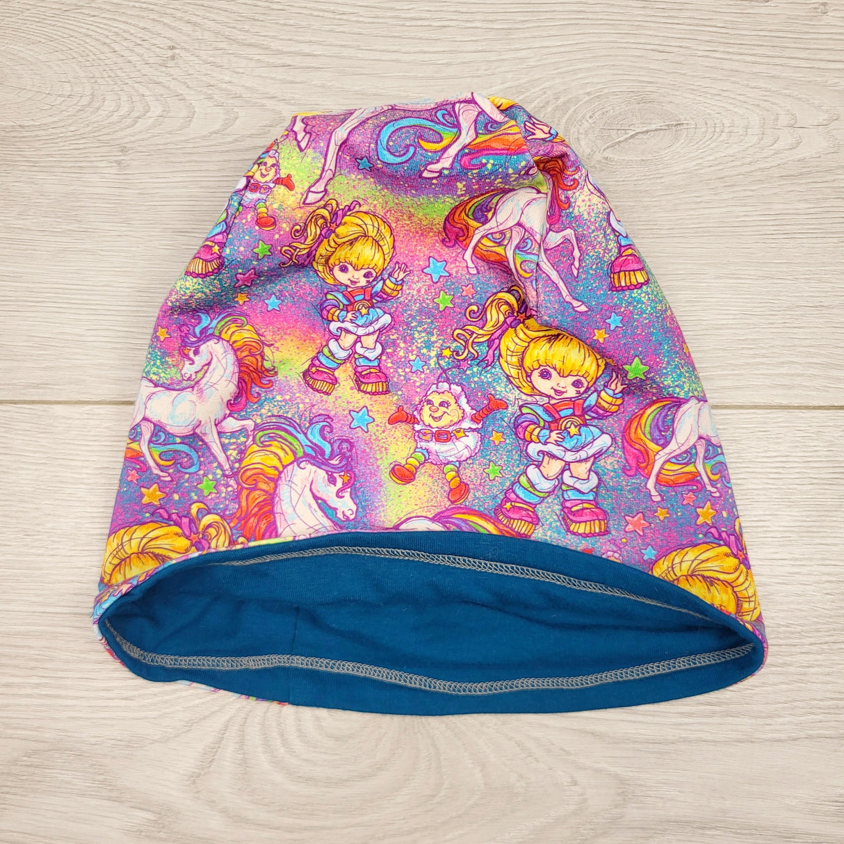 CKLB1 - Lavender and Lilac Designs handmade reversible Rainbow Brite beanie. Approx 4 to 6 years