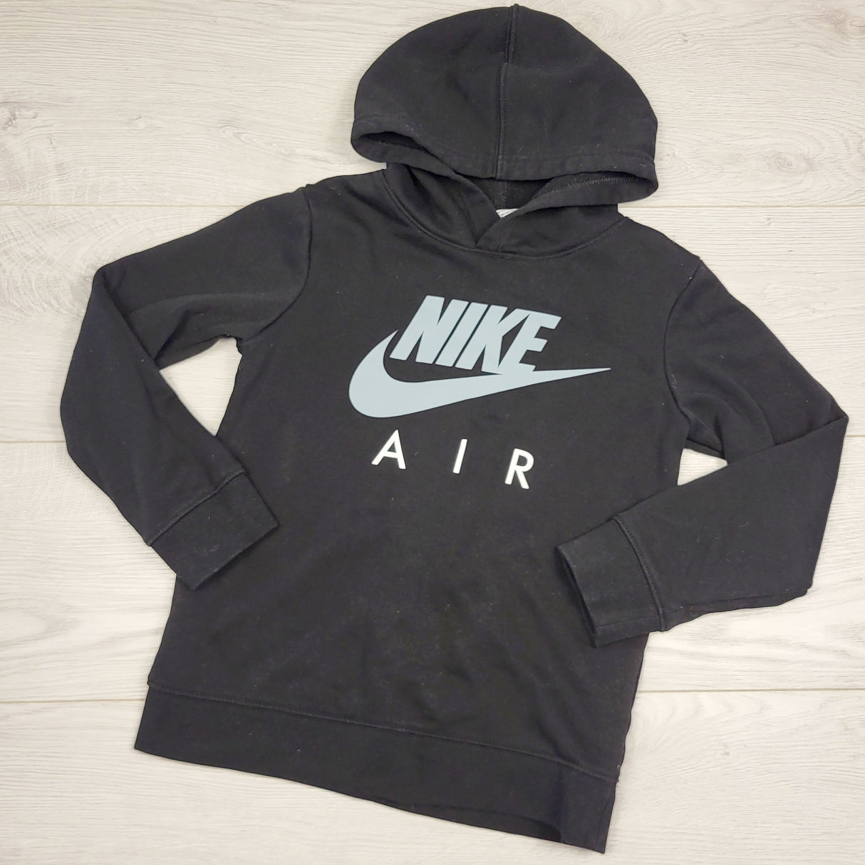 CKLB1 - Nike Air black fleecy lined pullover hoodie. Size 6/7