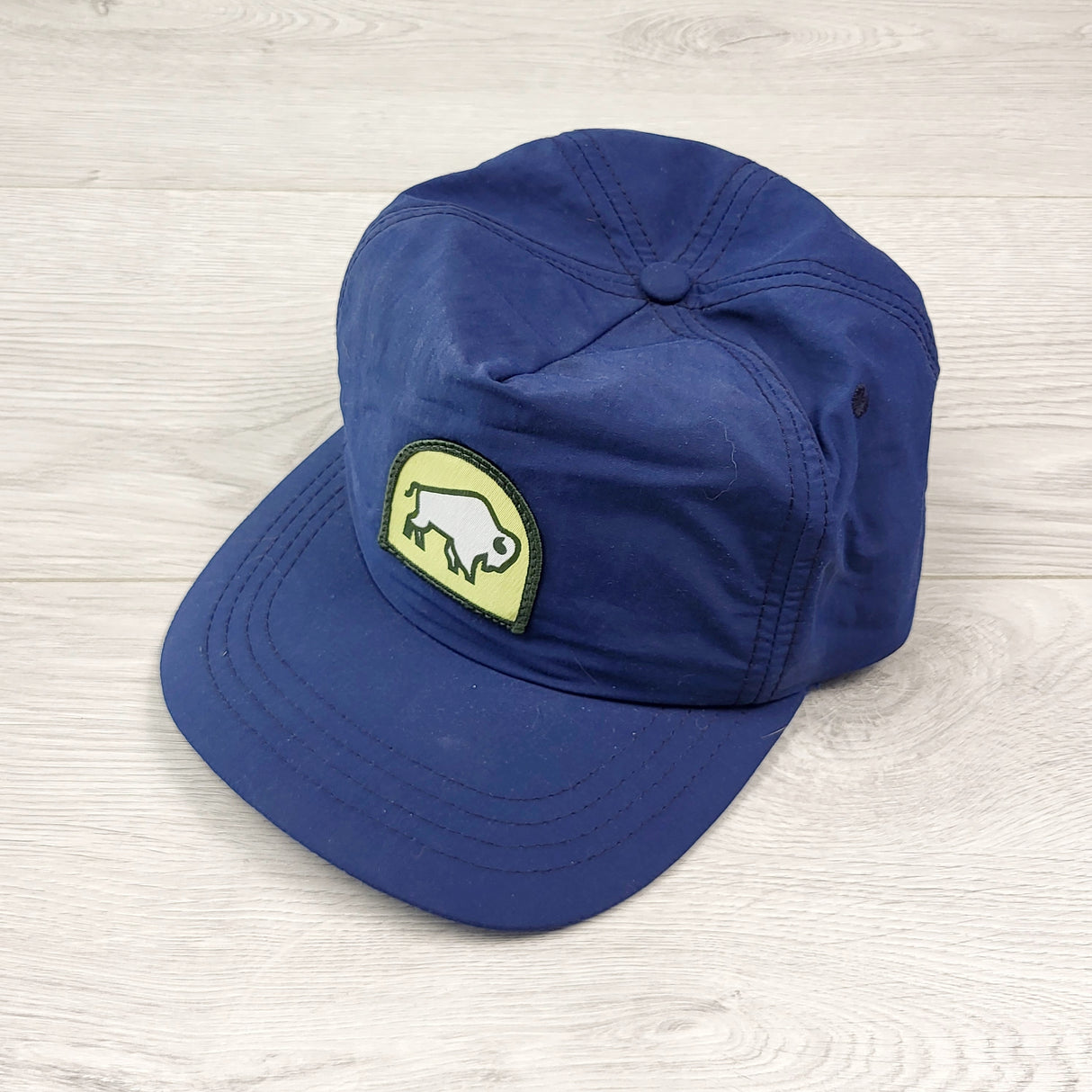 KHW1 - Ambler navy snapback nylon cap. Fits approx 3 to 7 years