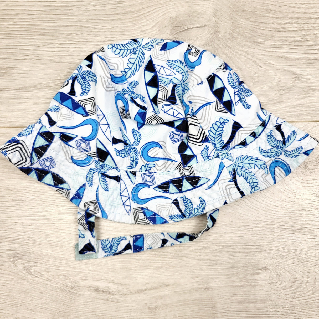 RZA1 - Blue bucket hat with beach theme. Size 0-24 months