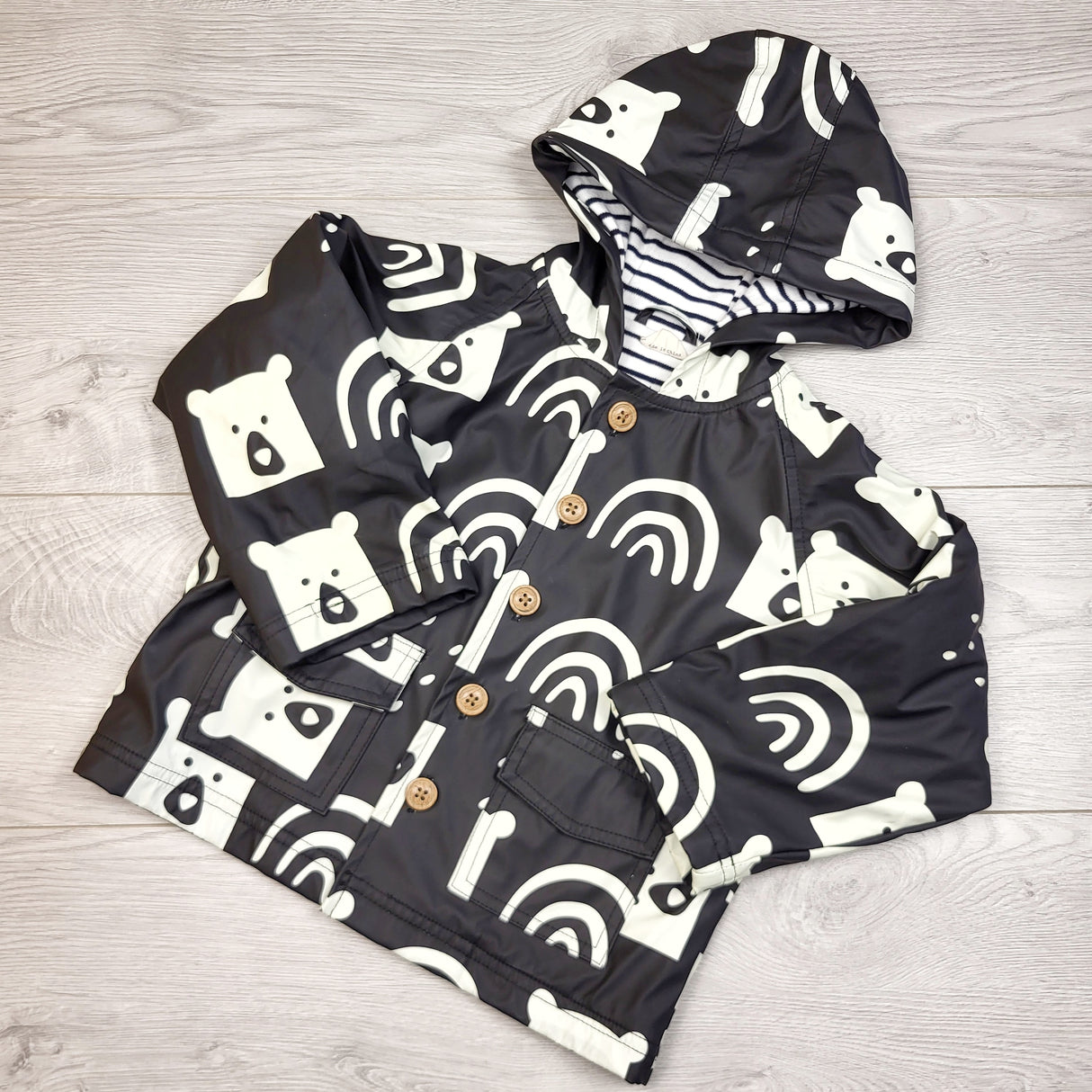 DMKY1 - Turtledove London black and white terrycloth lined rain coat with bears and rainbows. Size 1-2 Years