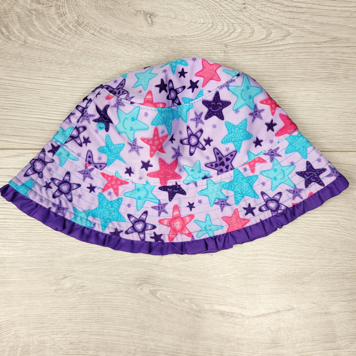 RZA2 - UV Skinz purple reversible bucket hat. Approx 2/3T