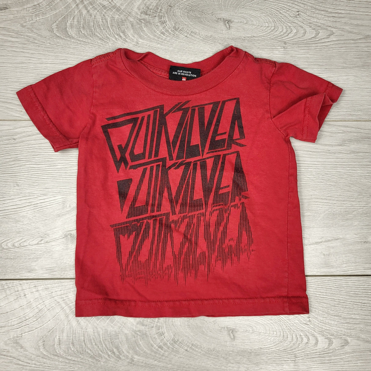 NTLL1 - Quiksilver red t-shirt. Approx 12-18 months