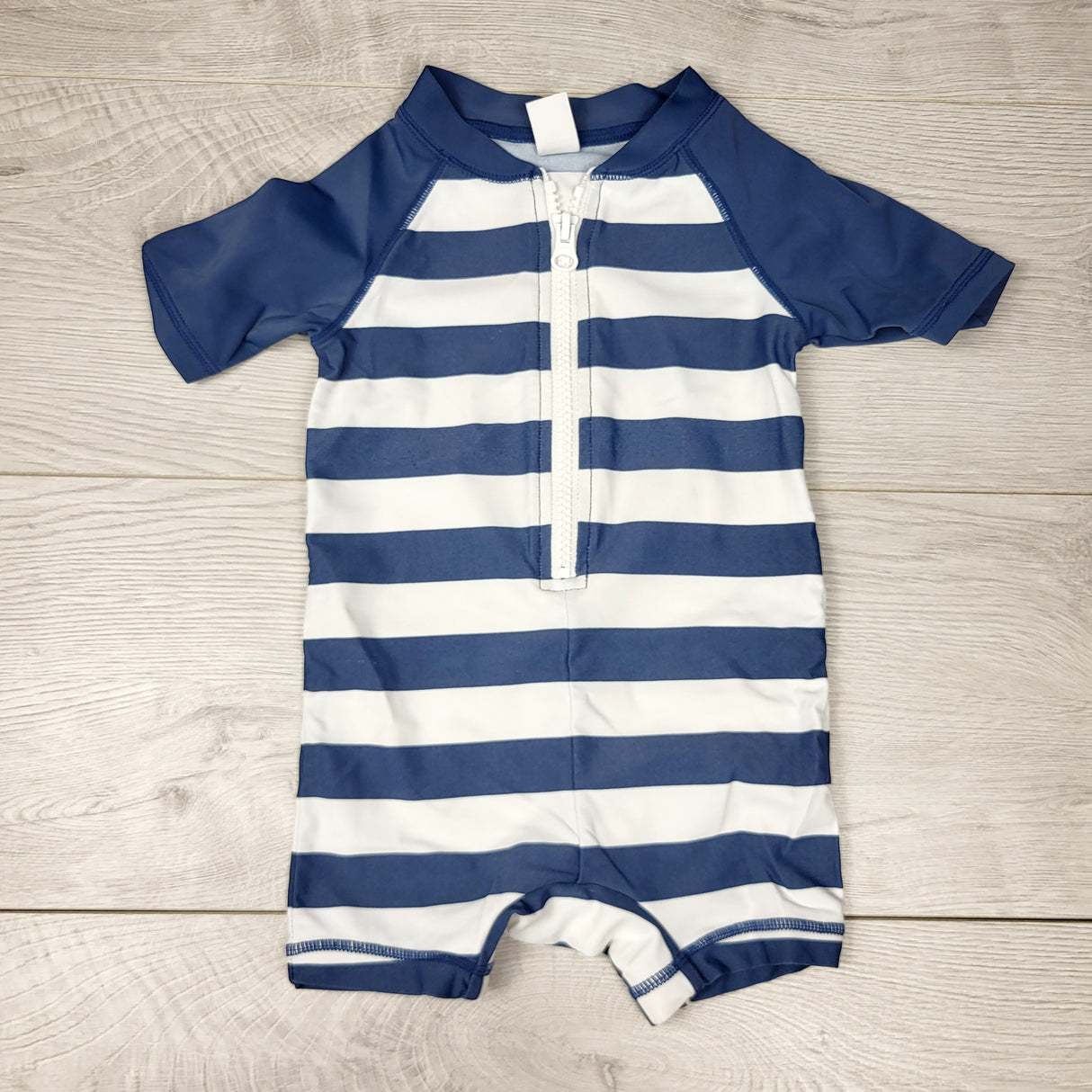 NTLL1 - Old Navy blue and white striped one piece rash guard. Size 6-12 months