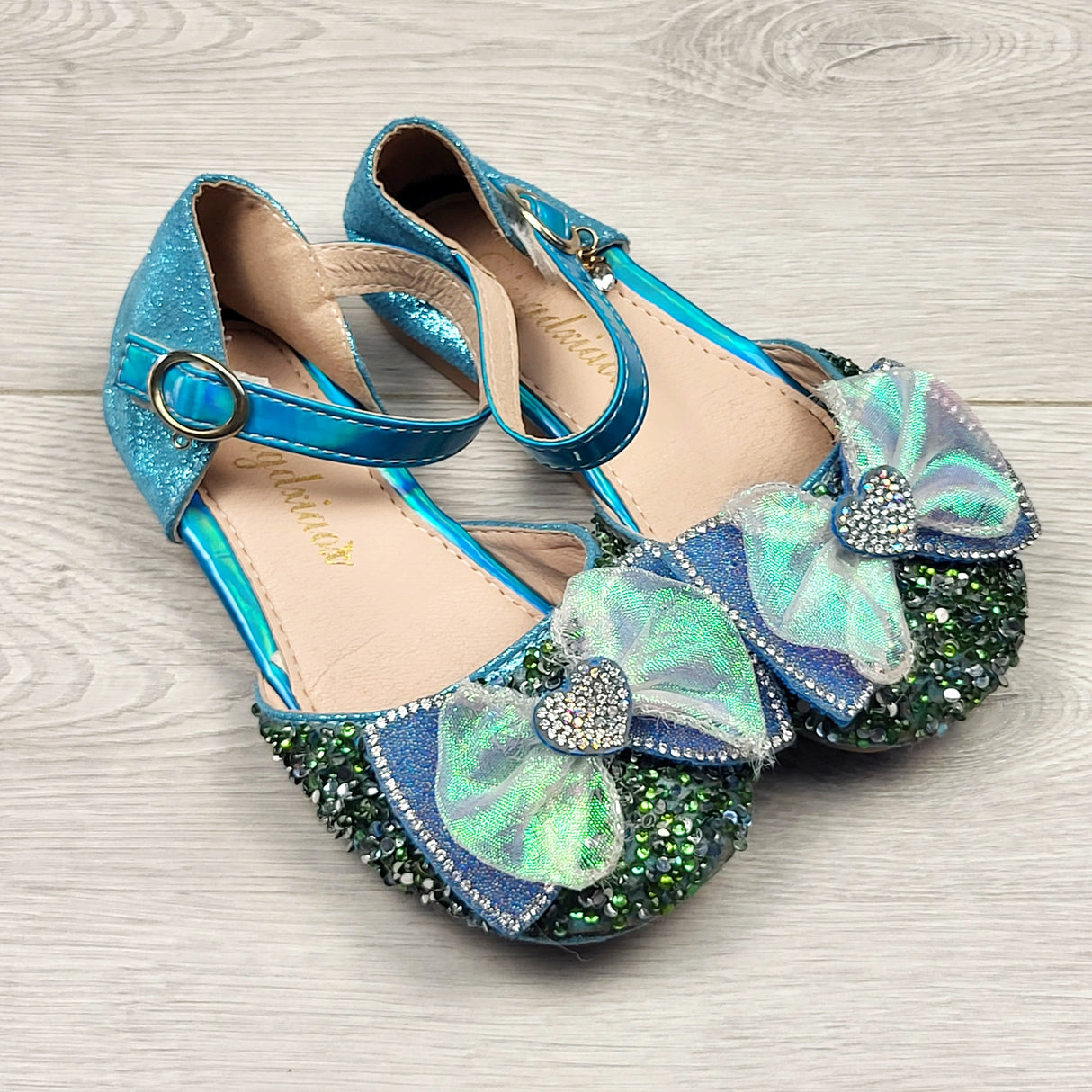 OAG1  - Dingdxiaox blue jeweled shoes with bows. Sizes like a 10.5