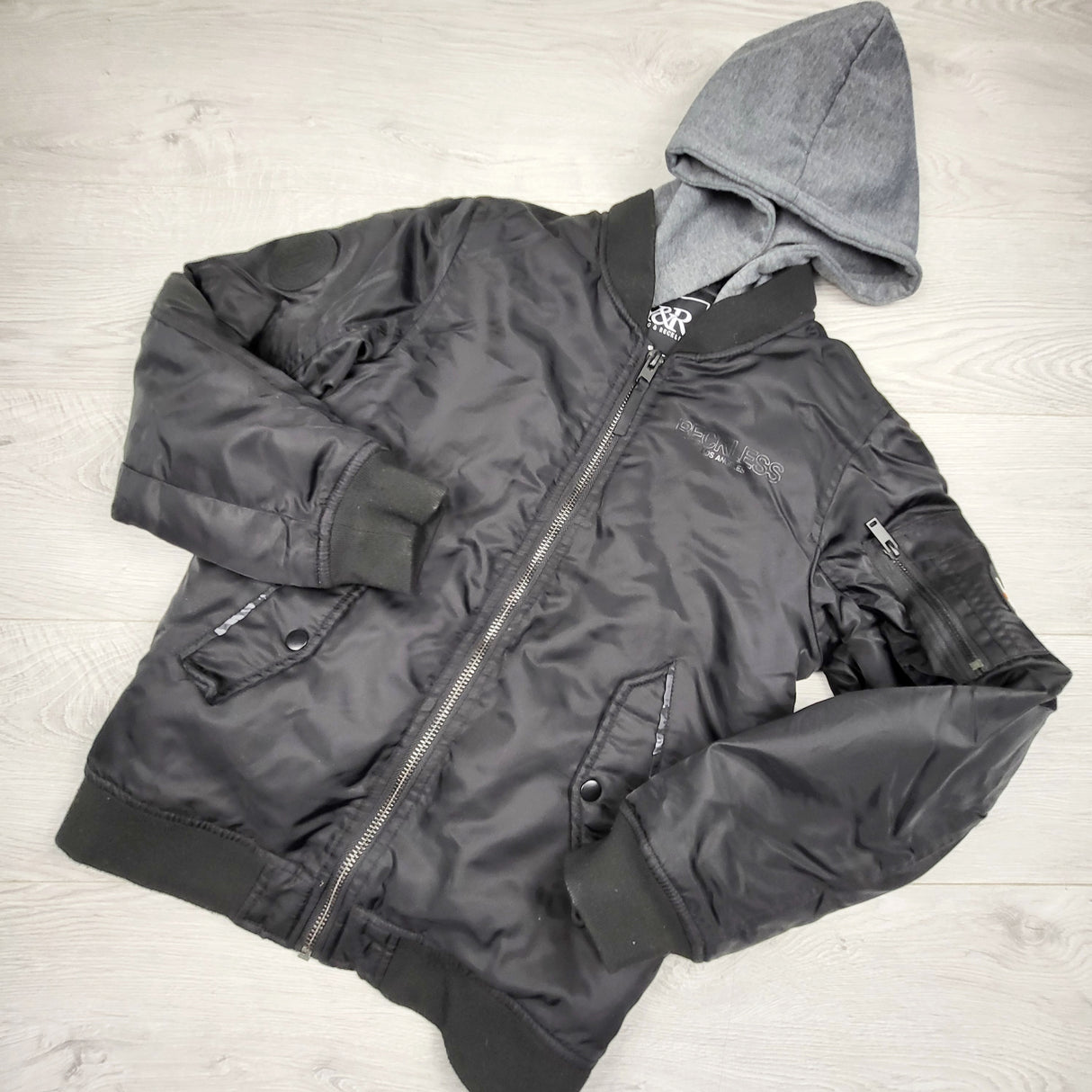 OAG1 - Young and Reckless black hooded bomber jacket. Size 14