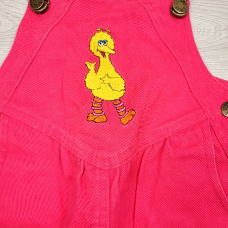 DMKY2 - Vintage pink Sesame Street Big Bird denim short overalls. Size 4T