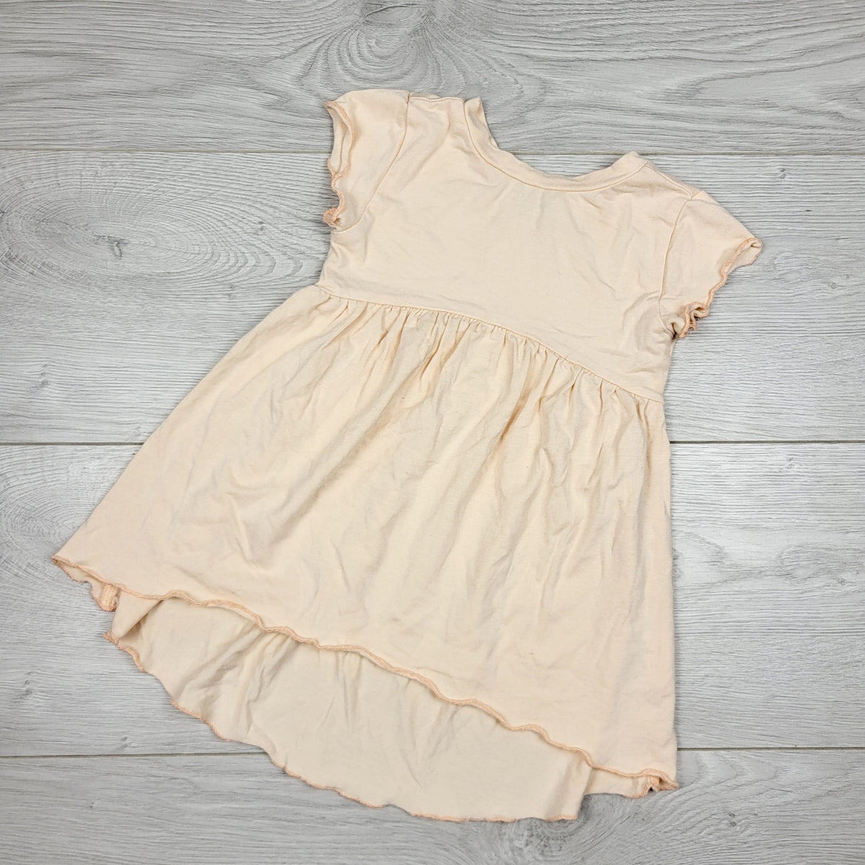 DMKY2 - North Kinder peach coloured handmade bamboo dress. Size 0-6 months