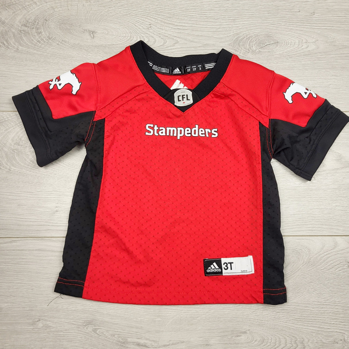 DMKY2 - Adidas CFL Calgary Stampeders jersey shirt. Size 3T