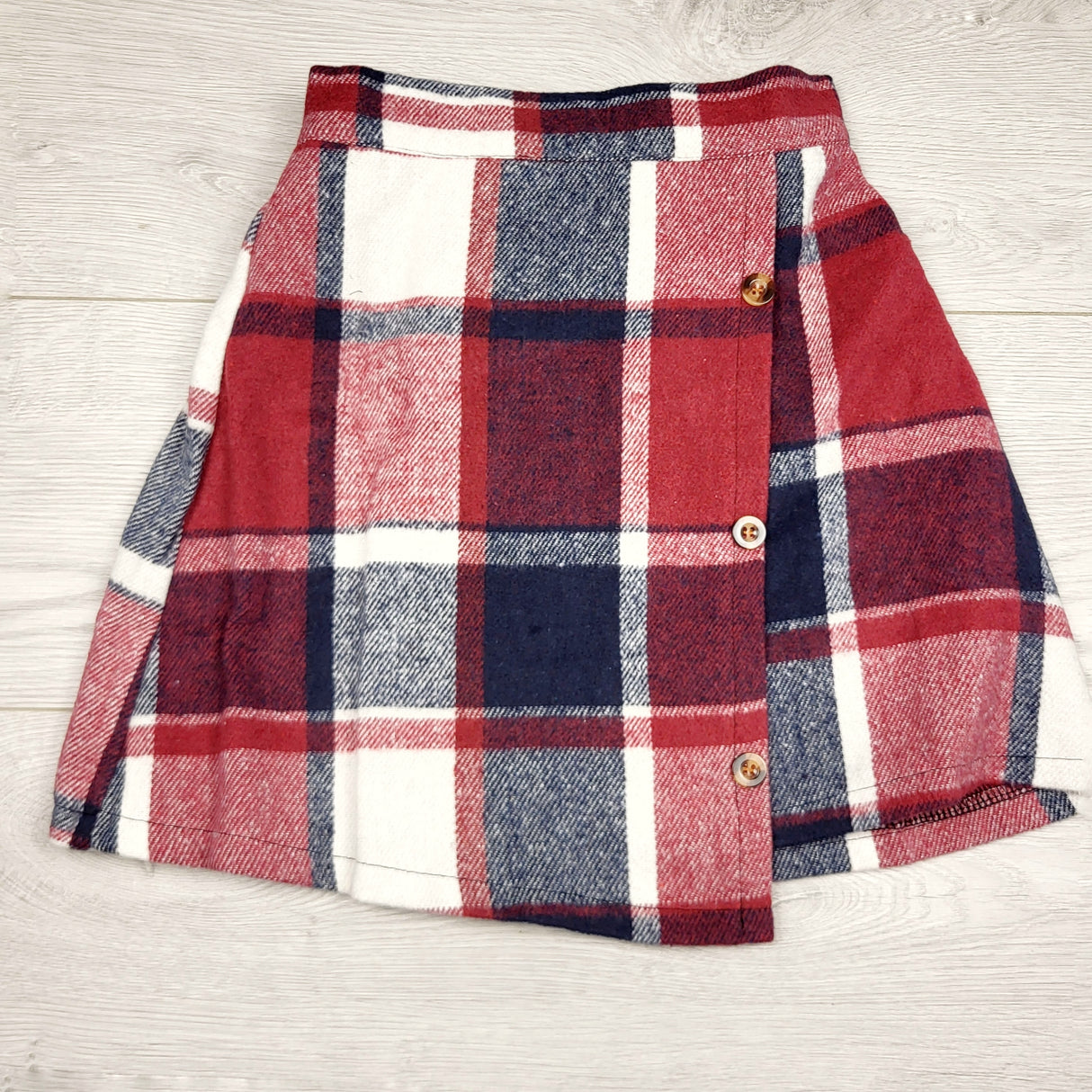 KTBL1 - Red and navy plaid skirt. Size 6/7