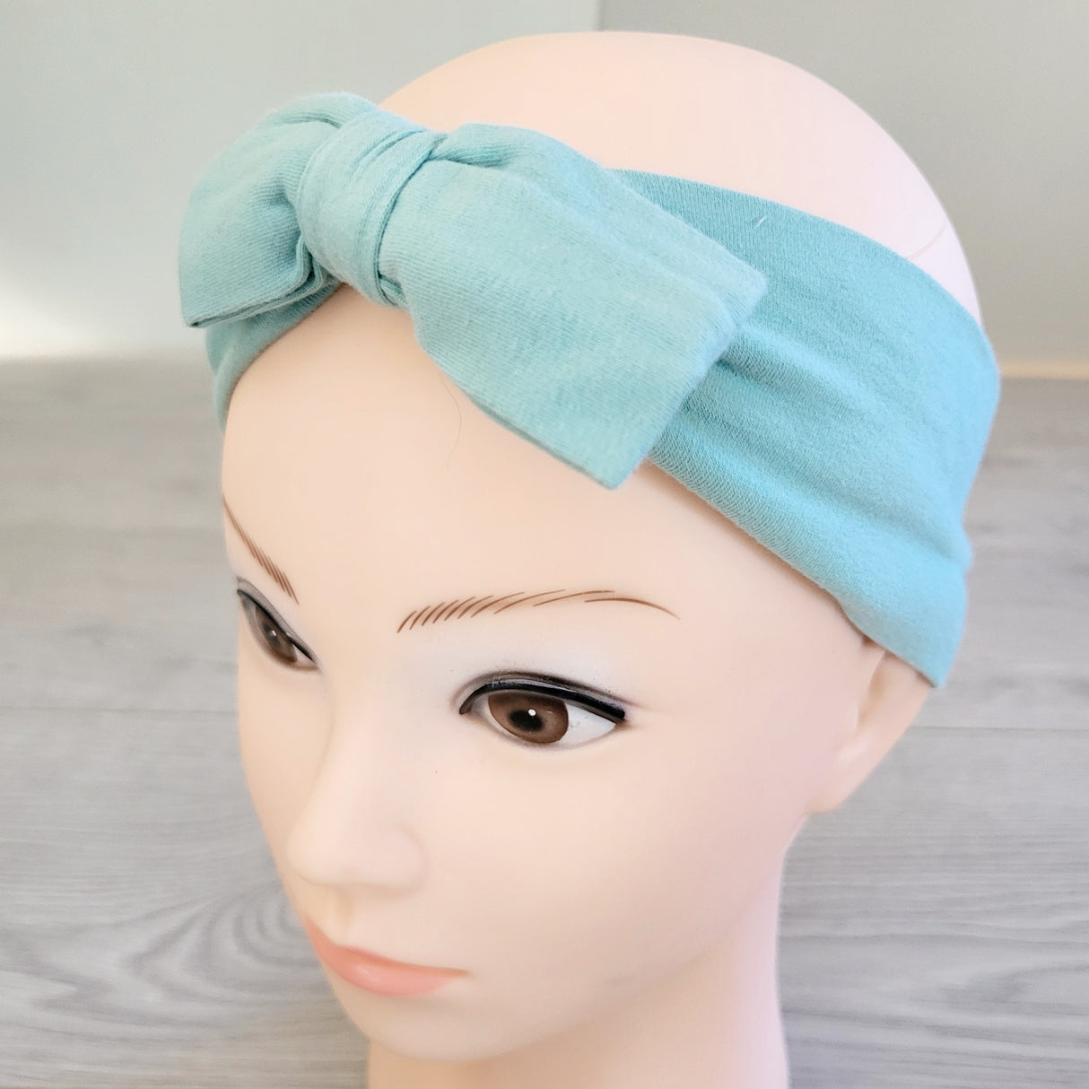 MGRE3 - Peekaboo Beans aqua colored headband with bow 🍁