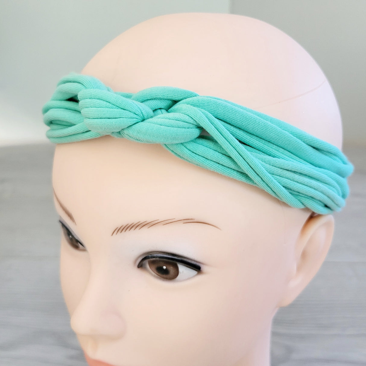 MGRE3 - Peekaboo Beans turquoise headband 🍁