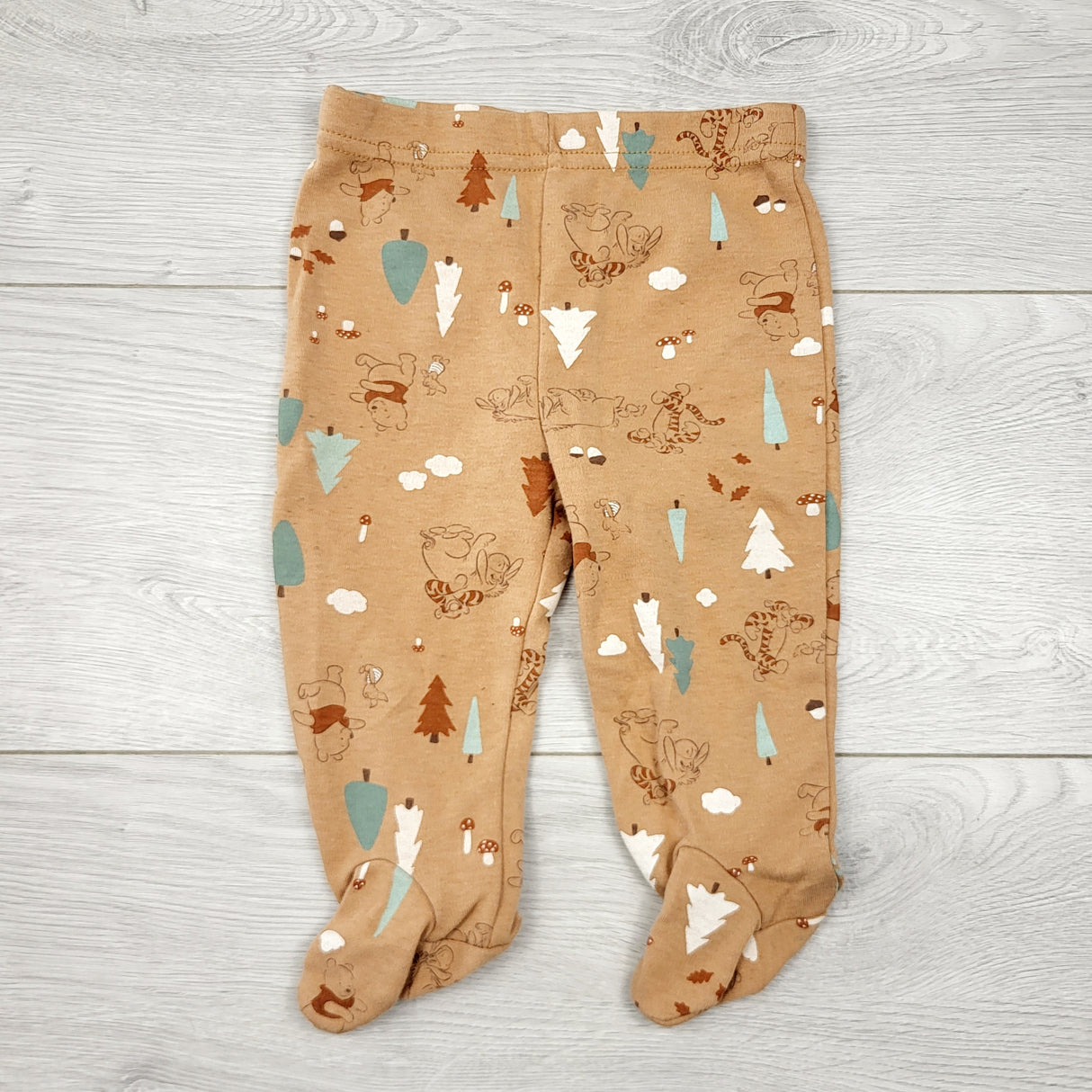 AALD11 - Disney tan footed pants. Size 3-6 months