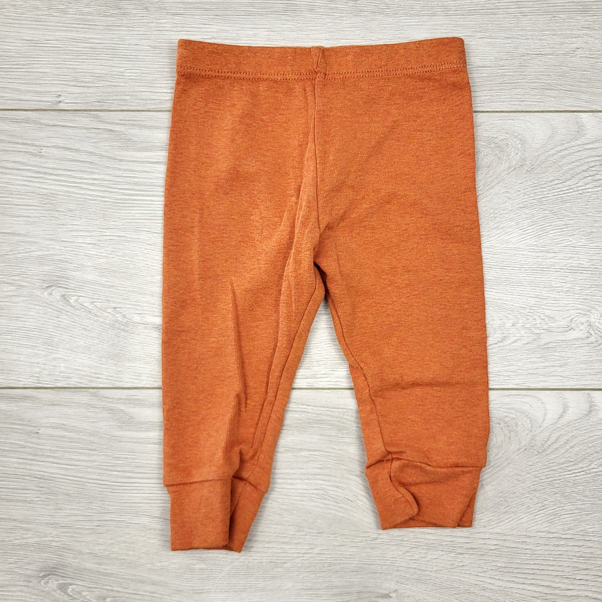 AALD11 - Pekkle orange cotton pants. Size 6 months