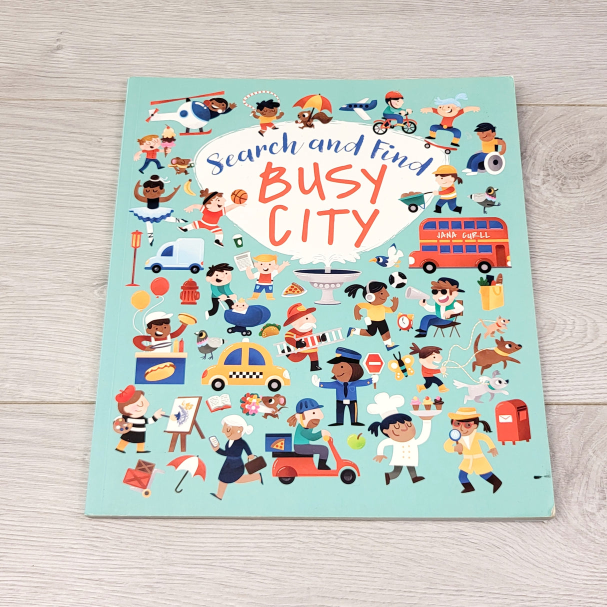 SPLT1 - Busy City Search and Find book. Soft cover look and find book