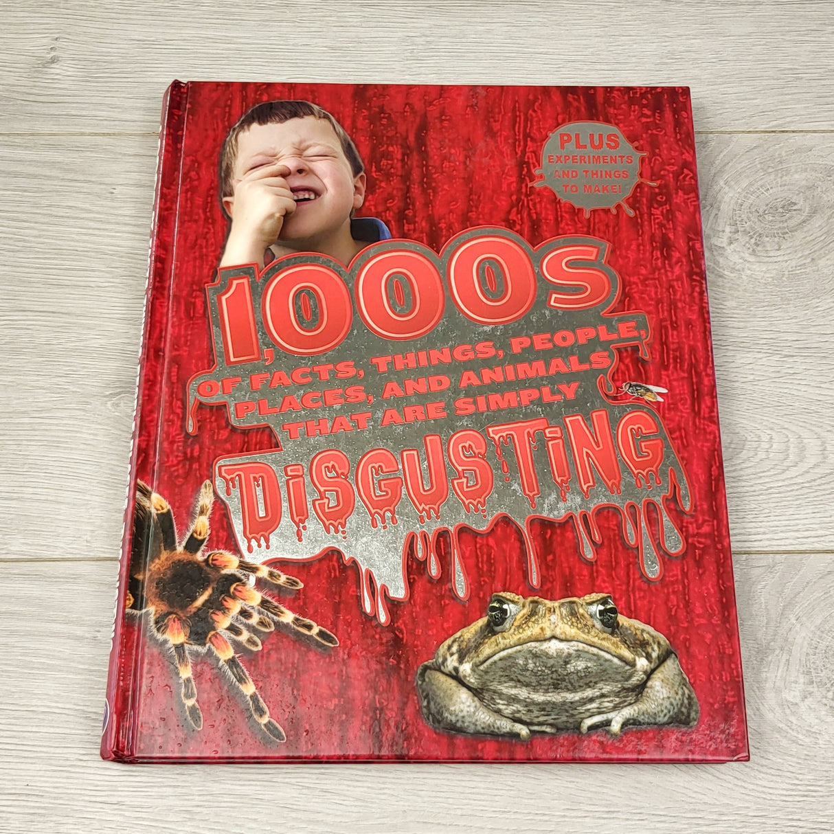 SPLT1 - 1000s of Facts, Things, People, Places and Animals That Are Simply Disgusting. Hardcover info style book. Local pick up or delivery only