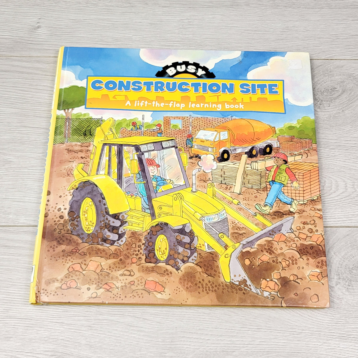 SPLT1 - Busy Construction Site. Hardcover lift the flap book