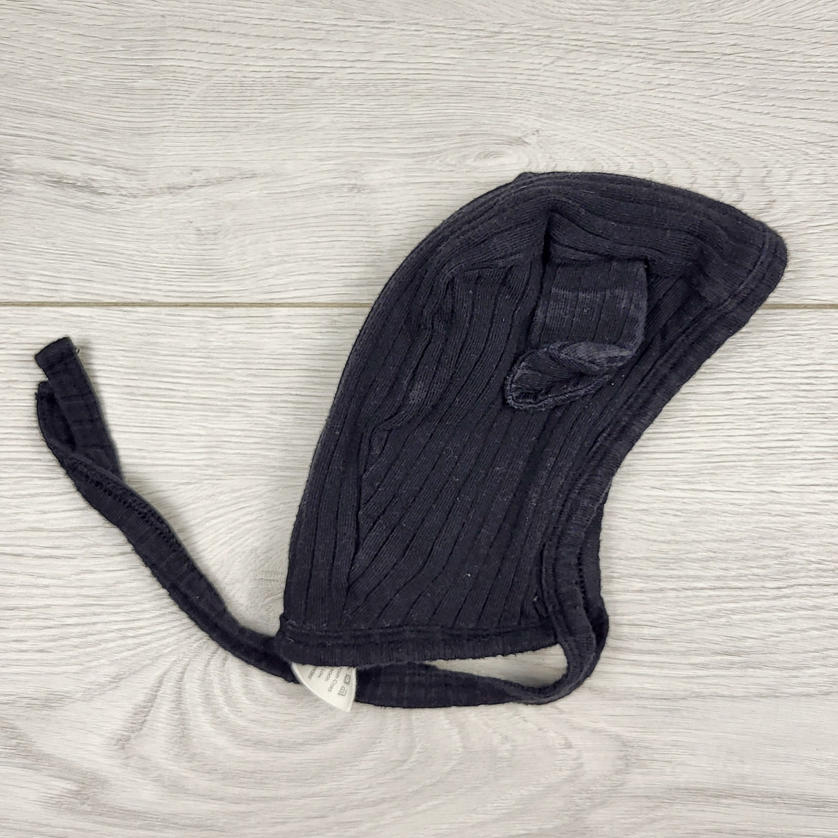 CCAM1 - Kate Quinn black ribbed organic cotton hat with ears. Size 3-6 months